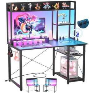 iSunirm Escritorio para Juegos Compartimento, Luces LED y Tomas de Corriente, 100 x 50 cm, estantes y Soporte para Monitor, Negro