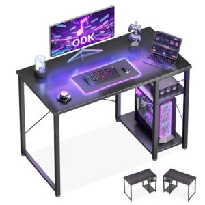 ODK Escritorio Gaming con Estantería Reversible, 100x48cm, Negro